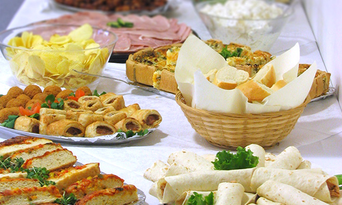 Display a table of snacks, appetizers, and game day favorites at your special event.