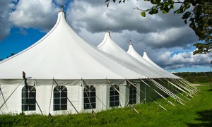 Window-style tent sidewalls and peaked roofs offer a unique setting for this event.