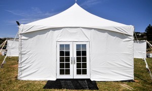 Simple white tent with glass French doors.